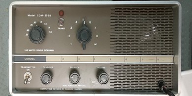  HF SSB transceiver with 8 channel + broadcast band selector switch, BC band tuning knob,  3 other knobs,  1 toggle switch and speaker grill on right.